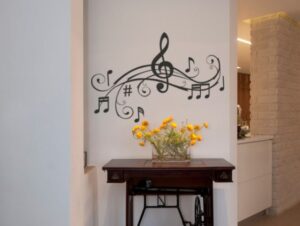 מדבקת קיר | תווים מסתלסלים