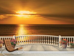 מרפסת עם נוף מרהיב לשקיעה בים - טפט קיר