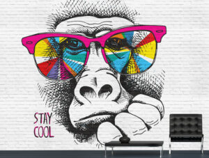 מדבקת טפט - גרפיטי קוף על קיר בריקים